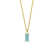 This blue topaz birthstone necklace showcases a serene sky-blue gemstone in an elegant pendant necklace for women.